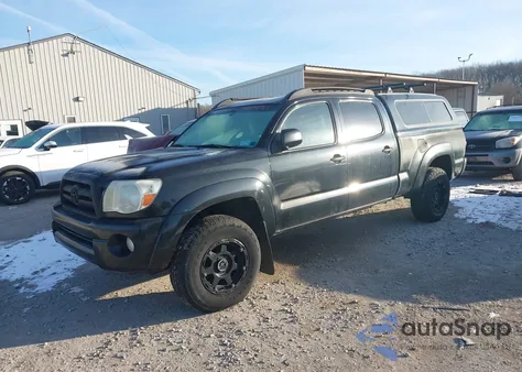 2009 Toyota Tacoma Base V6 из США, поврежденный, VIN 3TMMU52N49M010584